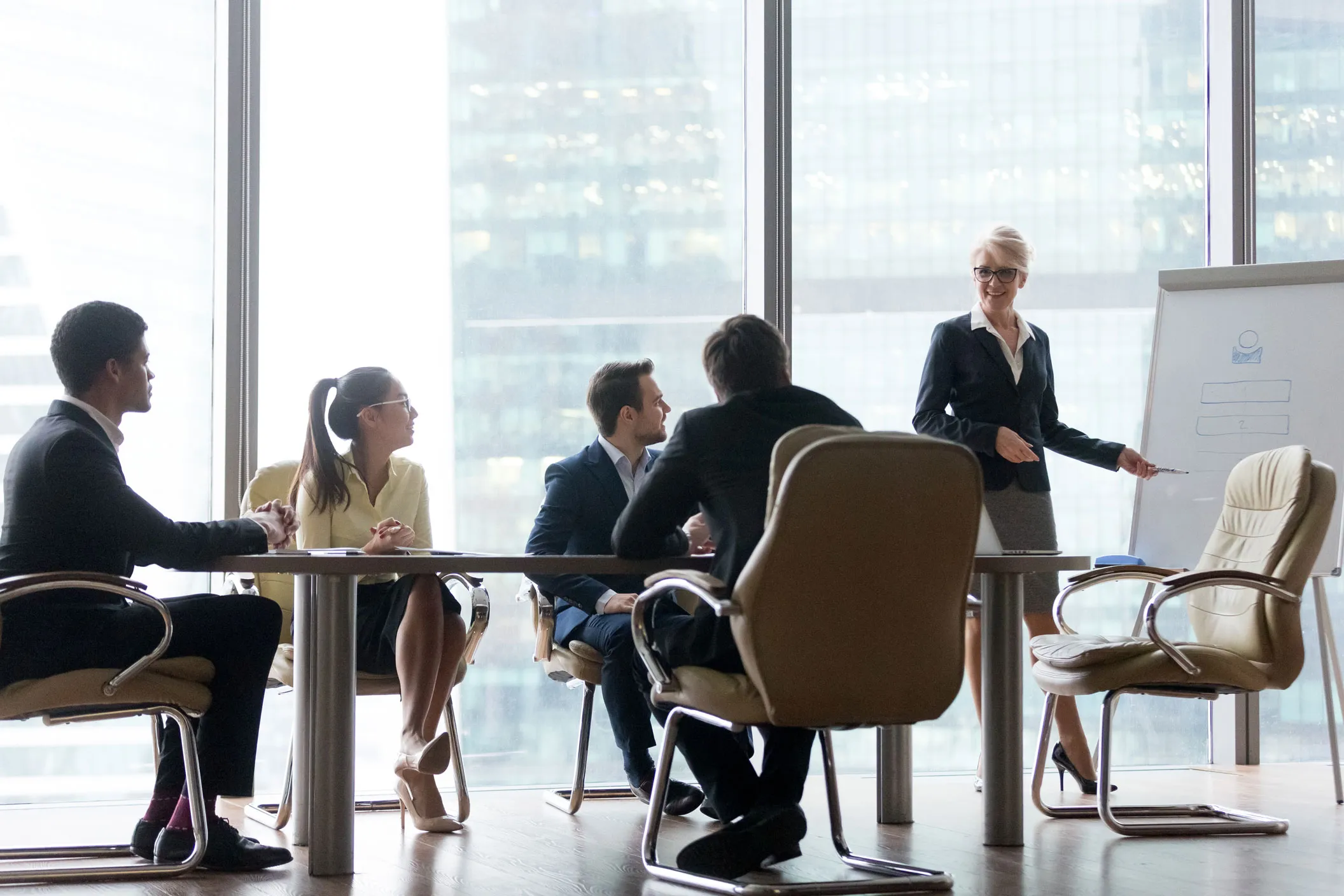 Marketing strategy meeting around a conference table